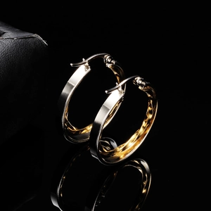 Two-tone 28mm hollow round hoop earrings in gold and silver stainless steel