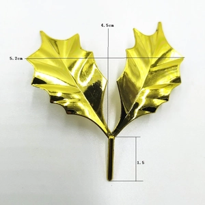 Golden holly leaf cake topper decoration made of electroplated plastic for festive bouquets