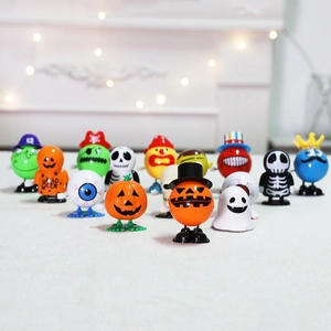 Collection of wind-up Halloween pumpkin and ghost toys for party favors and fun