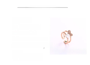 Detail view of adjustable double-layer ring with pearl and zirconia heart in rose gold