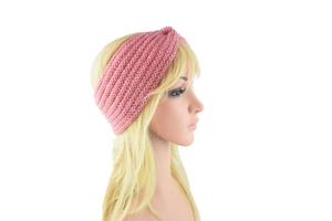 Close-up of pink knit headband with twist knot design on a mannequin model