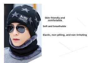 Detail of soft gray faux fur lining on a black knitted winter hat and neck warmer