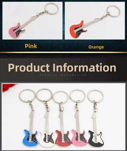 Detailed close-up of colorful electric guitar keychains in pink, blue, red, and black