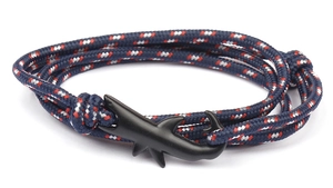 Detail of nautical braided paracord bracelet featuring a black matte shark anchor clasp