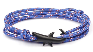 Detail of dark blue braided cord rope bracelet with black matte shark hook clasp