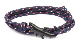 Detail of nautical shark wrap bracelet with navy woven rope and black matte shark buckle