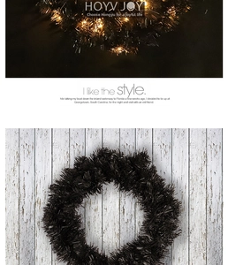 Detail of black PVC tinsel wreath with LED lights for Halloween and Christmas window display