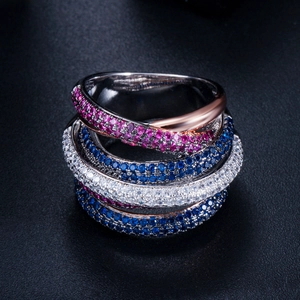 Macro detail of multi-layer ring featuring five rows of micro-set multi-color AAA cubic zirconia