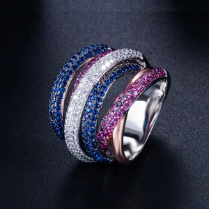 Multi-layer interlaced ring with blue, white and pink cubic zirconia in rose gold finish