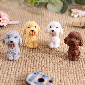 Macro shot of cute cartoon teddy dog erasers in four different colors with hair texture