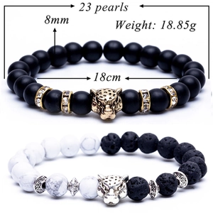 Detailed view of 8mm lava rock bracelets with golden leopard head and diamond-encrusted beads
