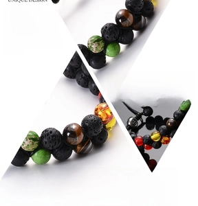 Detail view of double-row lava stone chakra bracelet with natural healing beads