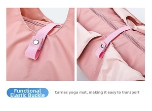 Detail view of the elastic buckle on a pink waterproof yoga bag for securing a yoga mat