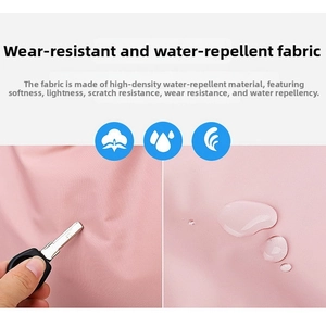 Macro detail of high-density pink waterproof fabric showing scratch-resistant surface