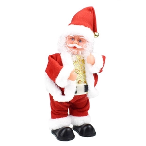 Detailed view of a classic Santa Claus clockwork toy in a red suit with golden patterns