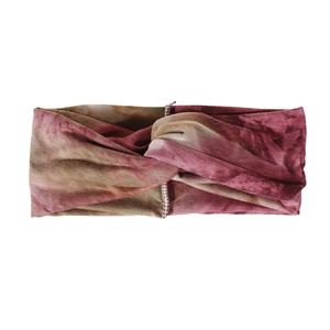 Detail of bohemian tie-dye knot headband in burgundy and brown with fine white stitching