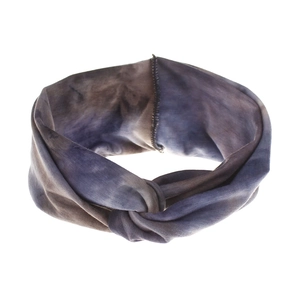 Close-up of Bohemian tie-dye elastic headband showing twist knot and soft knit fabric texture