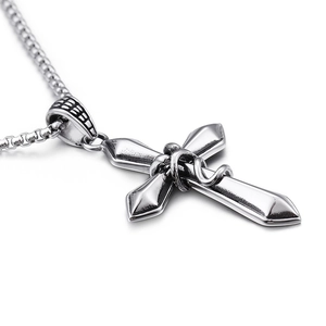 Polished stainless steel cross pendant featuring an entwined snake design on a square link chain