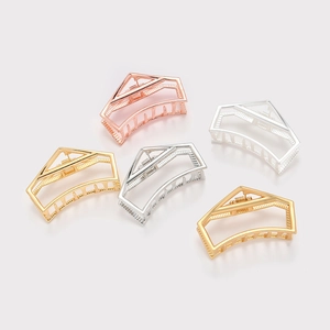 Selection of geometric hollow metal hair claws in rose gold, silver, and gold finishes