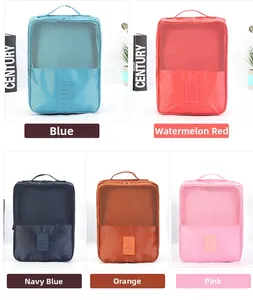 Waterproof travel shoe bags in blue, pink, and orange with breathable mesh windows