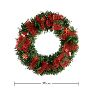 Couronne de Noël 30cm avec nœuds rouges et filet vert pour décoration de porte festive
