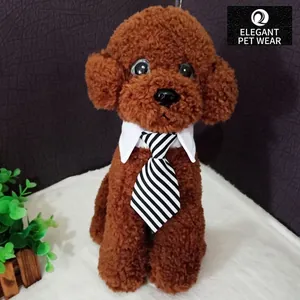 Brown teddy dog plush toy wearing a white collar and black-white striped necktie
