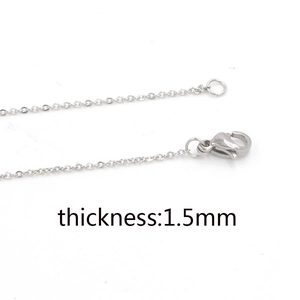 Detail of 1.5mm thickness silver stainless steel cross chain with lobster clasp