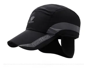 Detail view of winter baseball cap with ear flaps and thermal fleece lining for men
