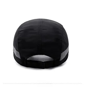 Rear view of winter baseball cap showing adjustable strap and reflective side details
