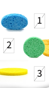 Macro detail of round honeycomb wood pulp sponge in blue, green, and yellow colors