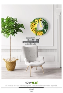 Close-up of decorative sunflower wreath with a yellow polka dot bow and hanging ornaments