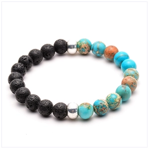 Macro detail of 8mm black lava stone and turquoise beads on a minimalist beaded bracelet