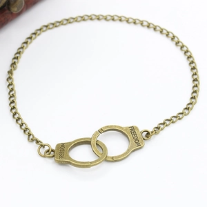 Vintage bronze handcuff bracelet with FREEDOM engraving on cross chains for women
