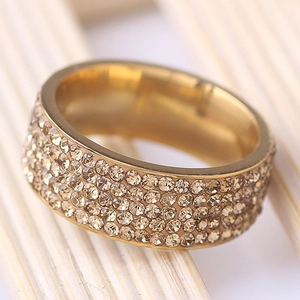 Golden five-row zircon stainless steel ring featuring champagne round crystals