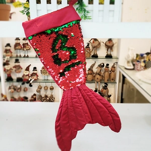 Sparkly red and green mermaid tail Christmas stocking with sequins and a soft quilted finish