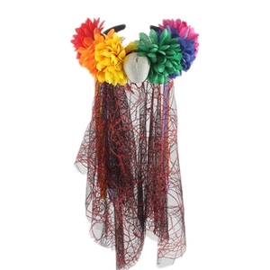 Detailed shot of multi-colored floral headband with patterned black mesh veil for Carnival