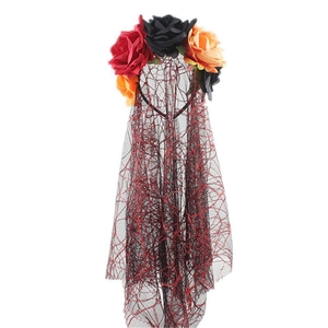 Detail of vintage veil headband with red, black, and orange roses and spider web pattern