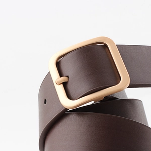 Women's dark brown leather belt with a square gold buckle on a clean white background