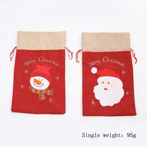 Set di 2 sacchetti regalo di Natale con Babbo Natale e pupazzo di neve in iuta rossa