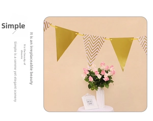 Detail of gold and purple chevron pennant banner for wedding and birthday party decor