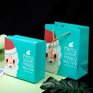 Green Christmas gift box set with Santa Claus illustration and matching paper carry bag