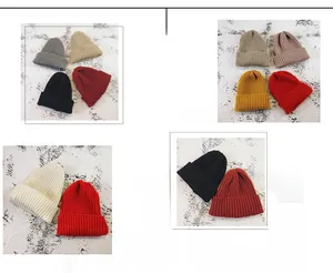 Detailed close-up of chunky knit texture and ribbed pattern on colorful winter beanies