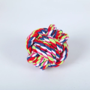 Close-up of a durable multi-color braided cotton rope ball toy for dog teeth cleaning