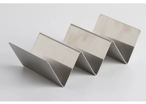 Close-up of a wavy stainless steel taco holder with three compartments on white background