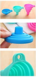 Close-up of three colorful foldable silicone funnels showing storage and hanging details