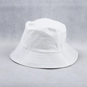 Minimalist plain white cotton bucket hat with parallel stitched brim on grey background