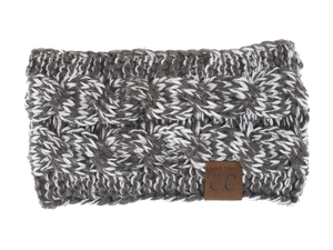 Close-up of cable knit texture on gray winter headband with brown C.C leather patch
