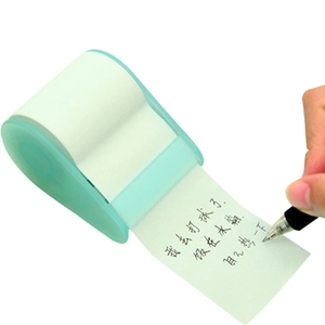 Light green sticky note roll dispenser with cutter and paper for student messages