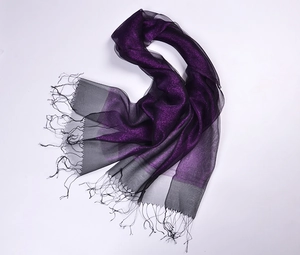 Detail of purple silk organza scarf with gold thread sparkle and black fringe tassels