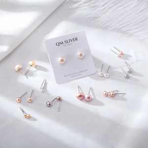 Multiple sizes of 925 silver freshwater pearl stud earrings in various natural colors
